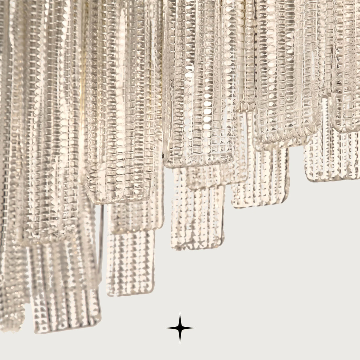 Top perspective showing gold frame structure and glass panel mounting on Isabella chandelier
