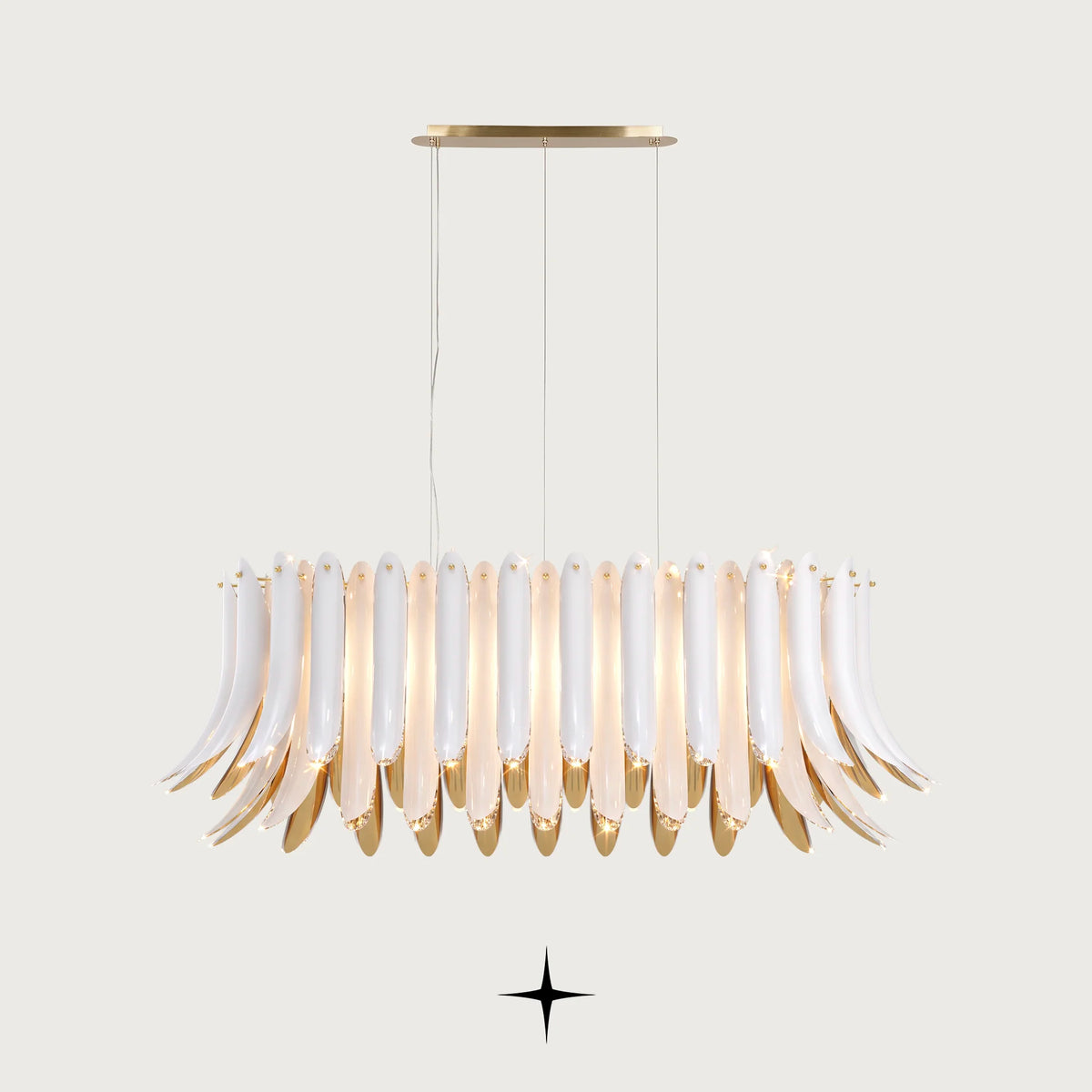 Linear Juliette chandelier featuring handcrafted crystal wings with white exteriors and golden interiors
