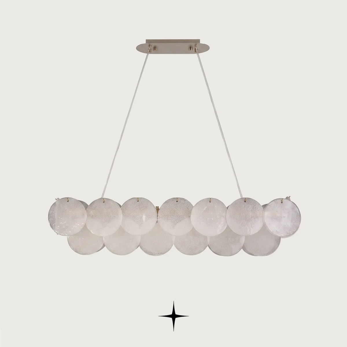 Linear Lunaria Chandelier featuring frosted glass discs resembling Lunaria seedpods and subtle brass accents.
