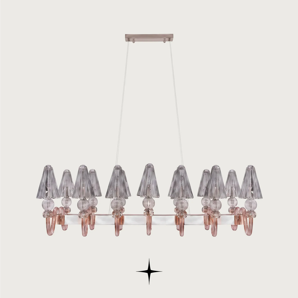 Linear Muse crystal chandelier suspended over a modern luxury dining space
