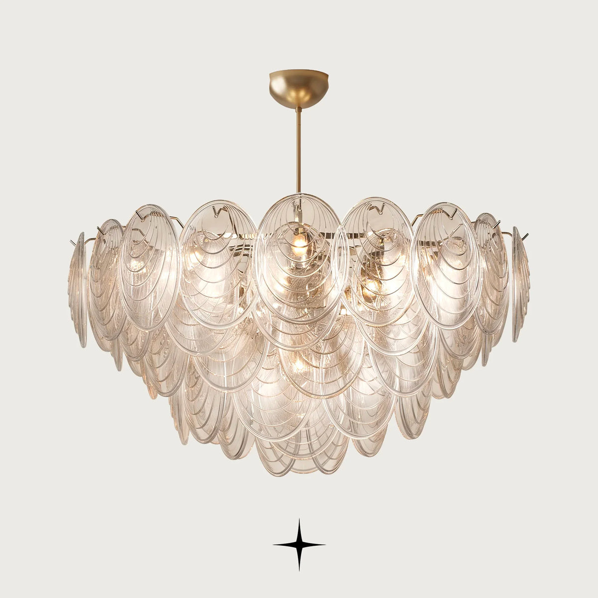 Elegant Moxie Chandelier featuring handcrafted Murano-style glass layered in an oval silhouette with a golden nickel chain and multi-tiered glass petals
