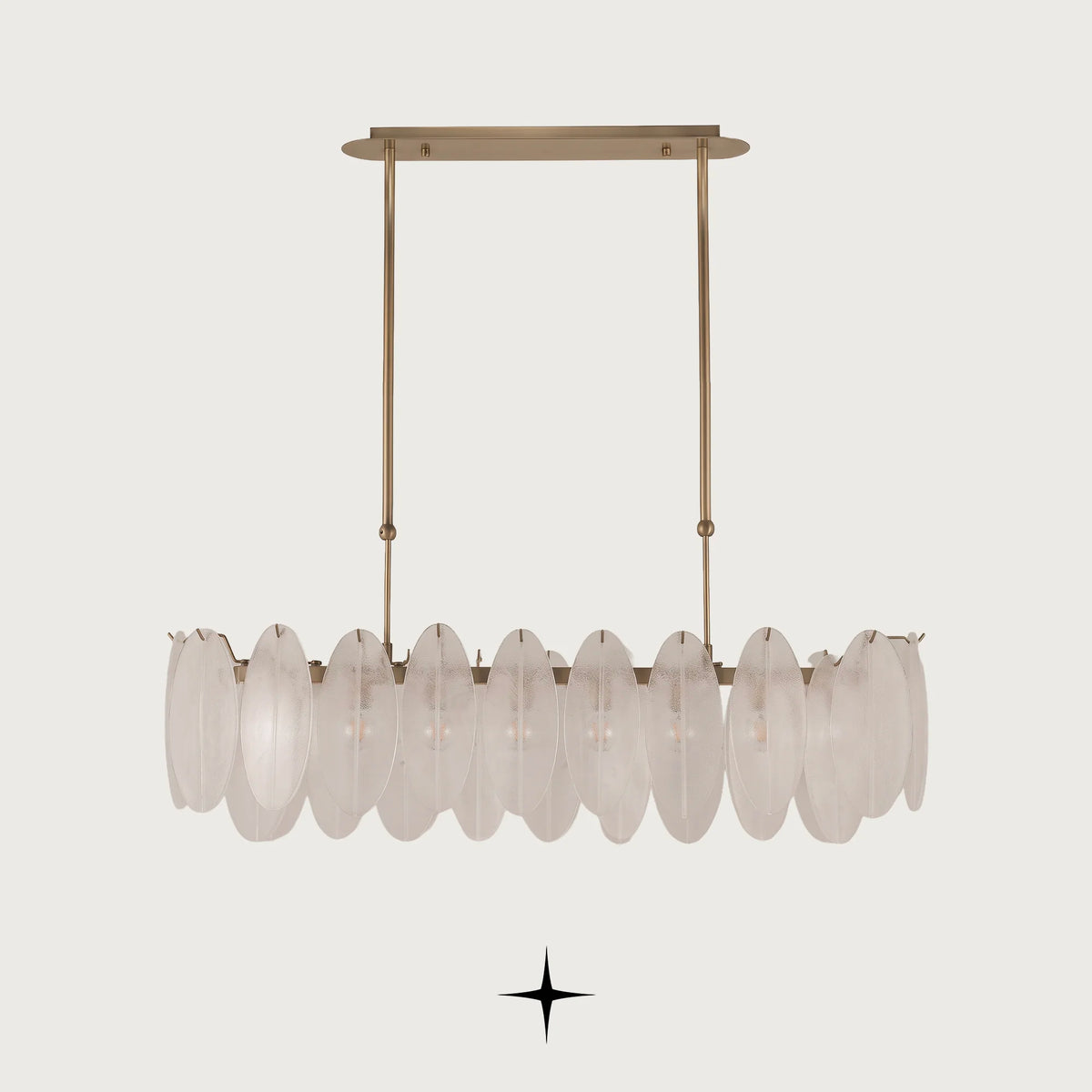 Linear Serene chandelier featuring oval crystals and a radiant golden structure