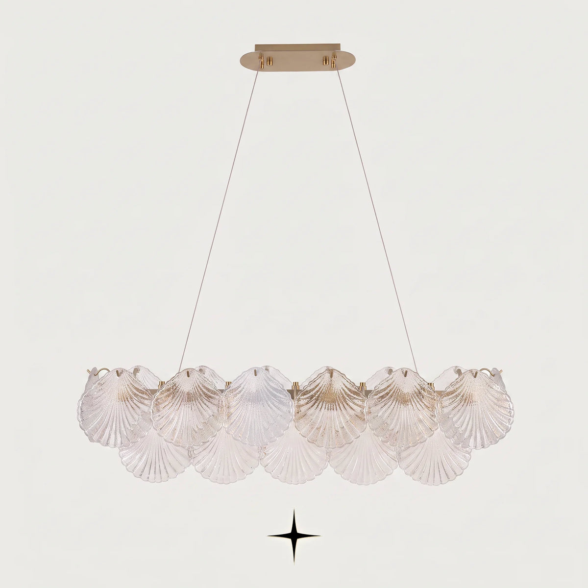 Front view of Linear Shellina coastal seashell glass island light fixture on light grey backdrop