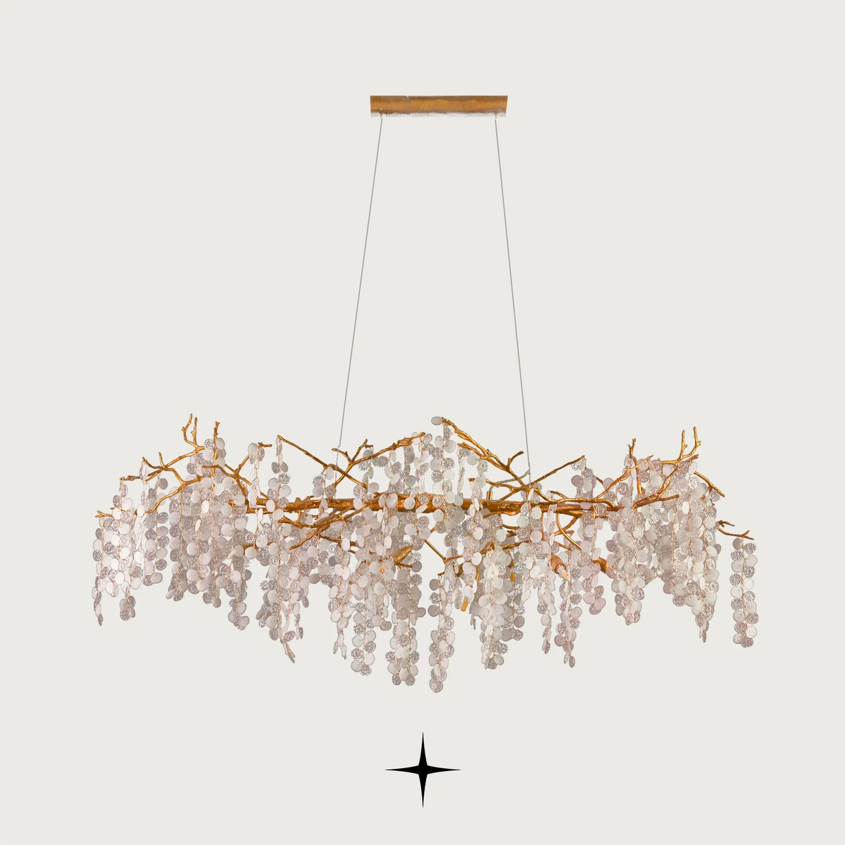 Linear Shiraz Chandelier featuring a brass branch structure and cascading crystal droplet strands.
