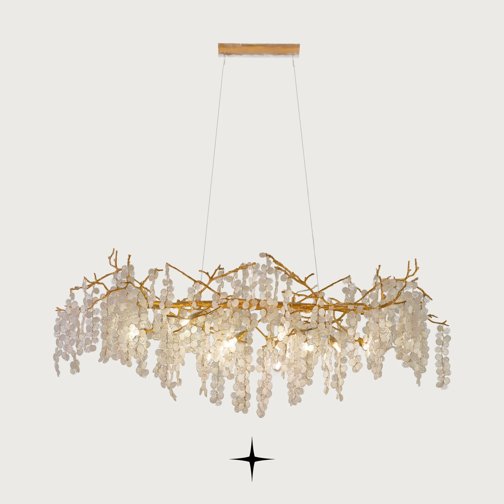 Linear Shiraz horizontal brass branch chandelier with crystal droplets on light grey background