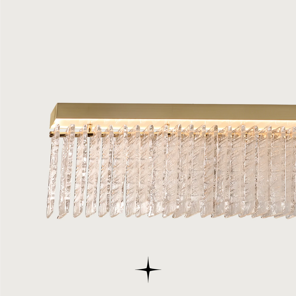 Linear Waterfall chandelier featuring cascading Murano-style glass elements and sophisticated warm illumination
