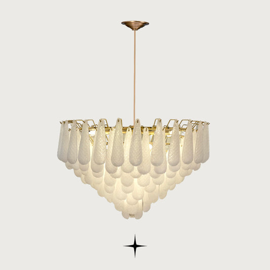 Miranda cascading textured glass droplet chandelier with gold stem on light grey background