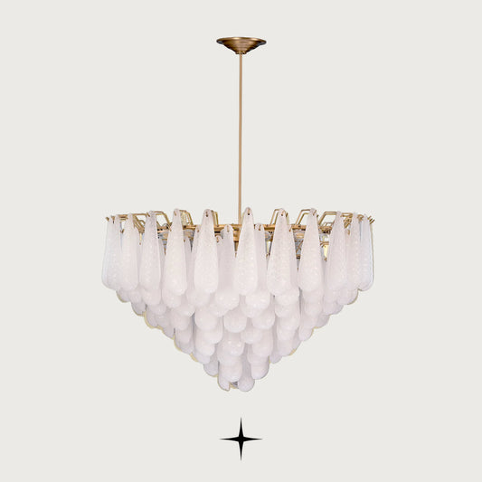 Front view of Miranda tiered glass droplet pendant chandelier on light grey backdrop