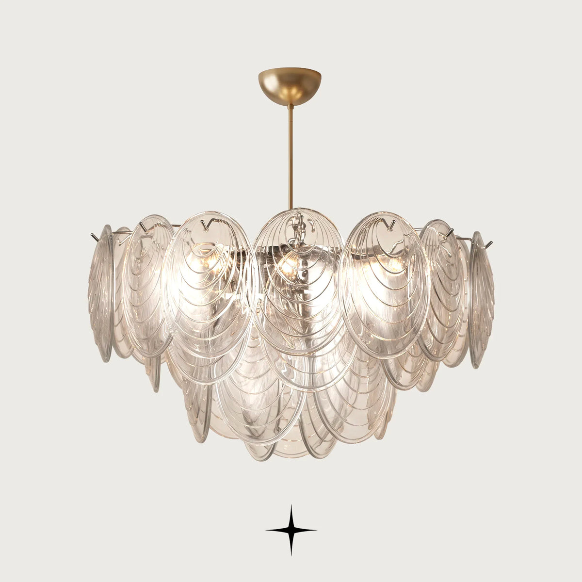 Moxie Chandelier featuring handcrafted Murano-style glass petals in an oval silhouette with a golden nickel chain and frame
