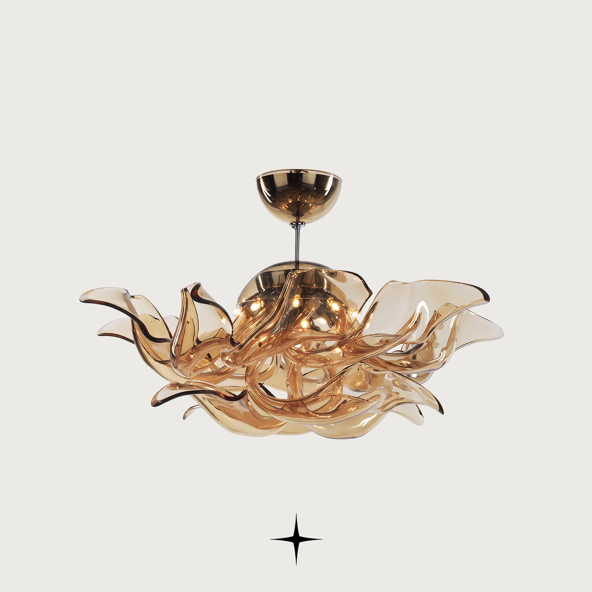 Naria Chandelier featuring chic elongated champagne crystal arms in multi-tier configurations
