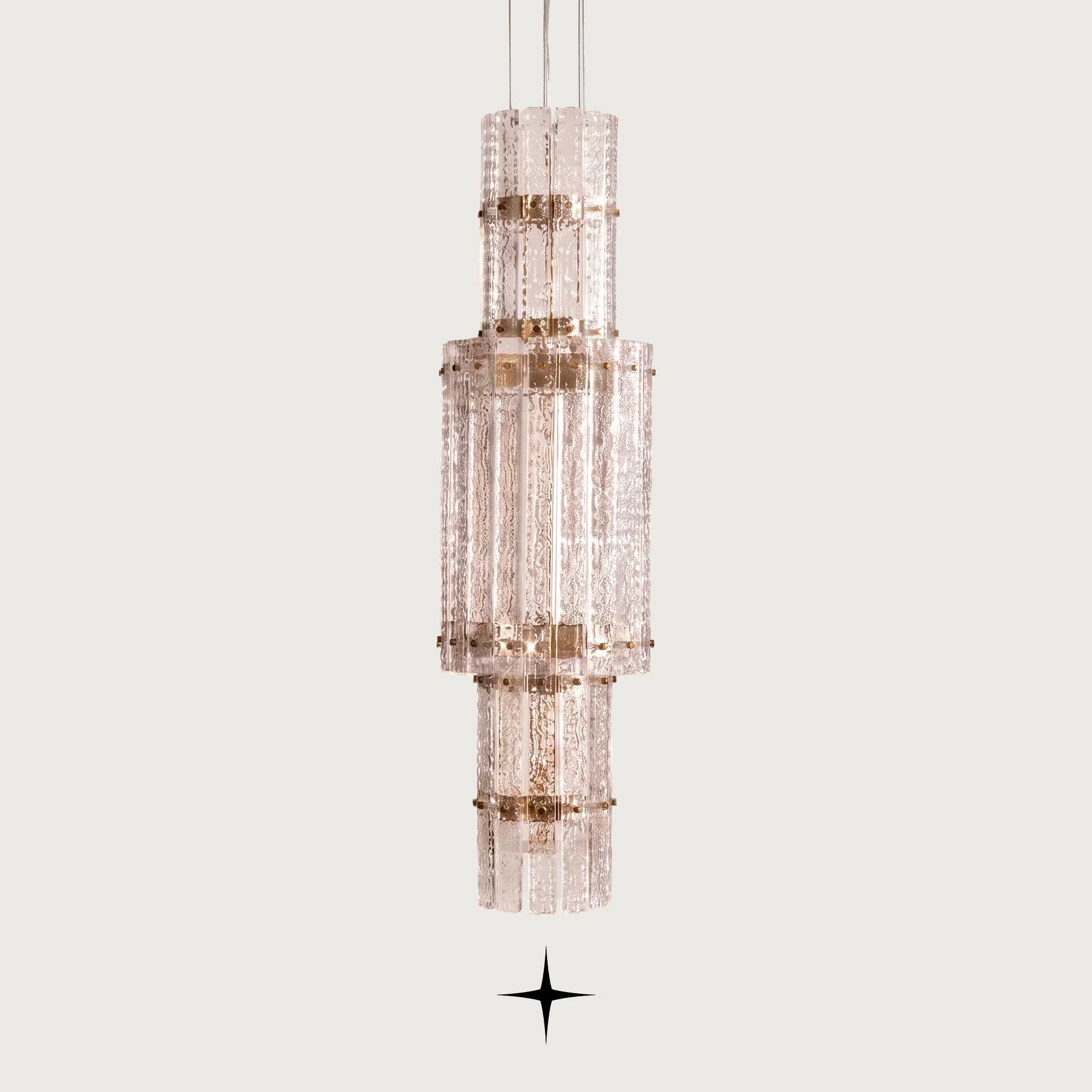 Front view of One Level Chime tall glass LED pendant fixture on light grey backdrop