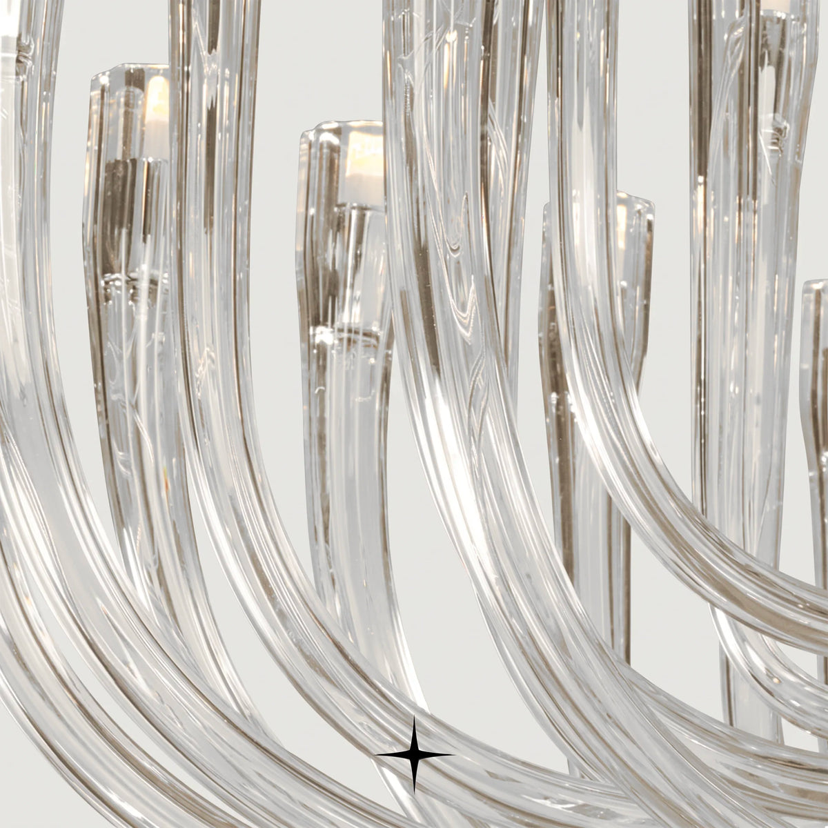 Close-up of illuminated ribbed crystal tube on Oval Bliss fixture