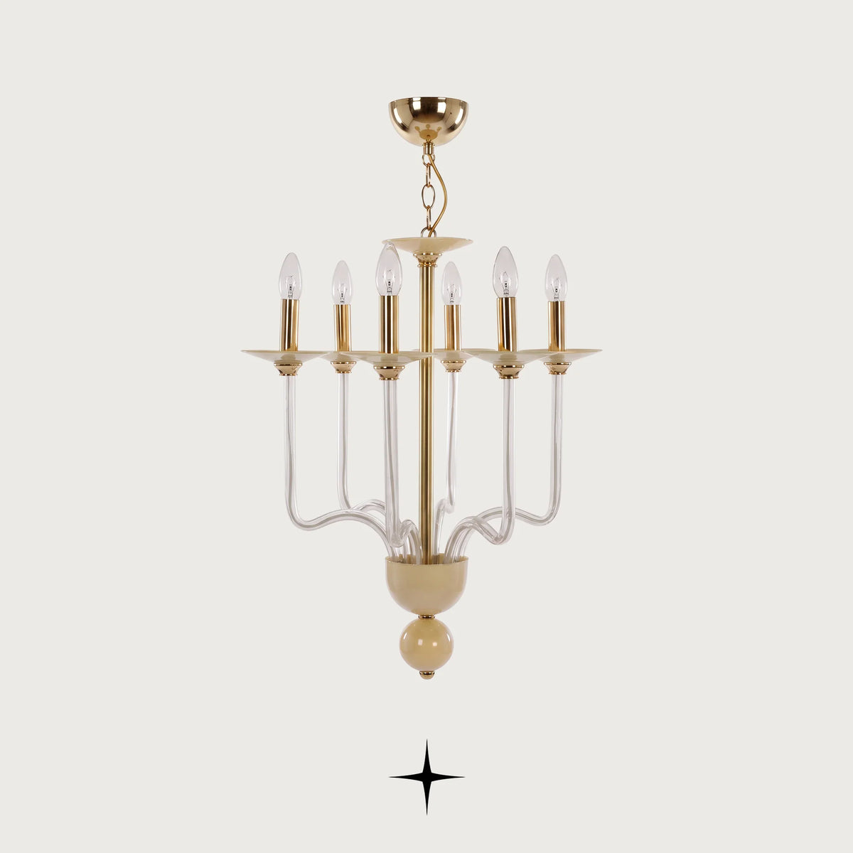 Petite Harmony Chandelier featuring cream-white glass arms with candle-style lights and brass accents
