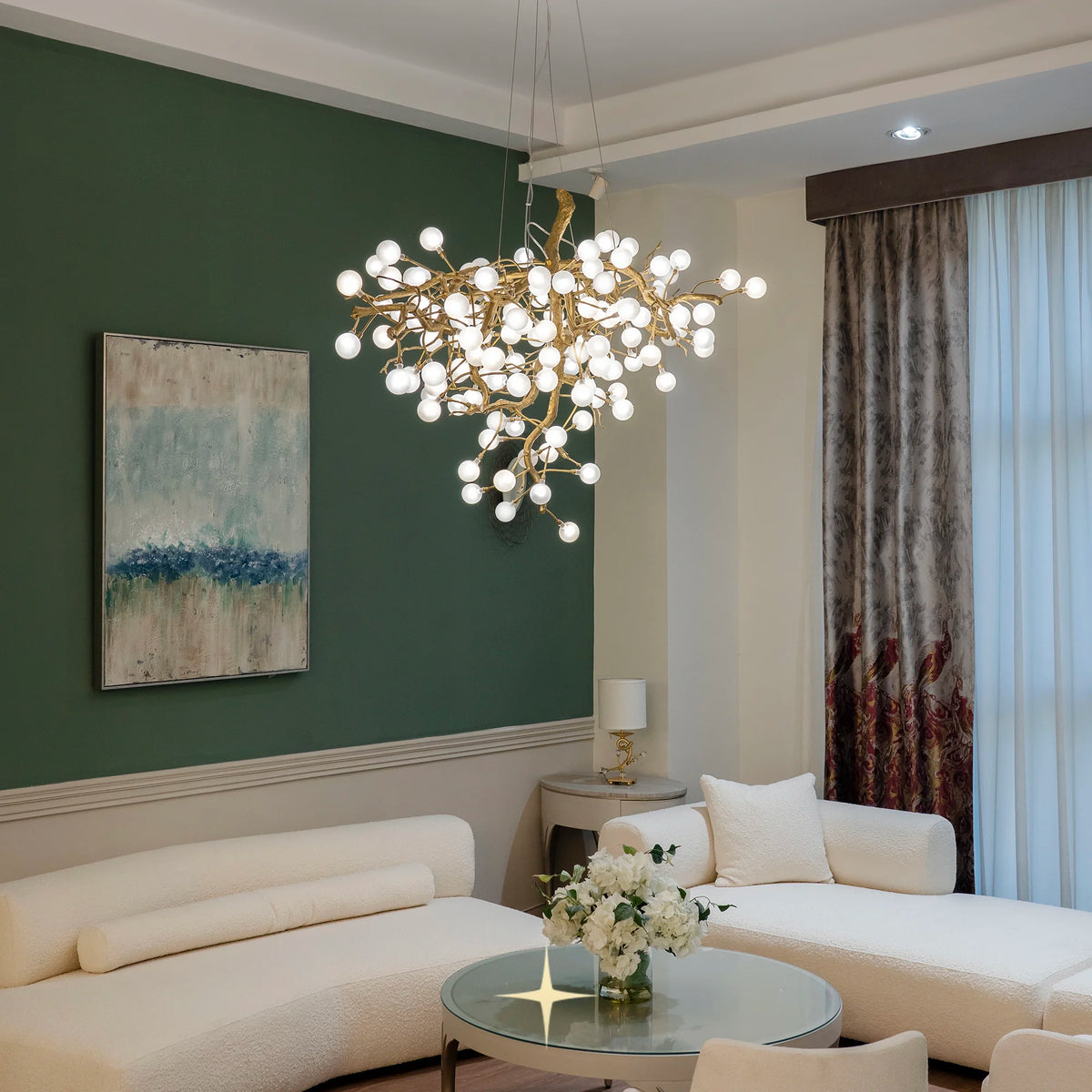 omantica crystal blossom chandelier installed in a modern luxury living room with green wall decor