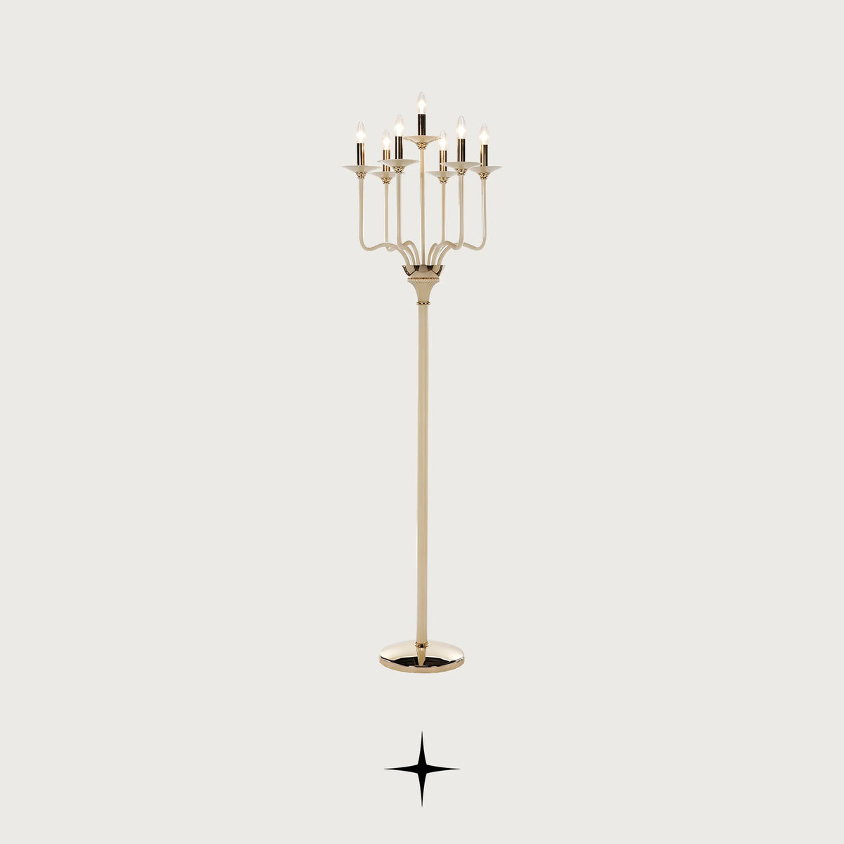 Front view of Harmony crystal candelabra floor lamp with brass stem on light grey background