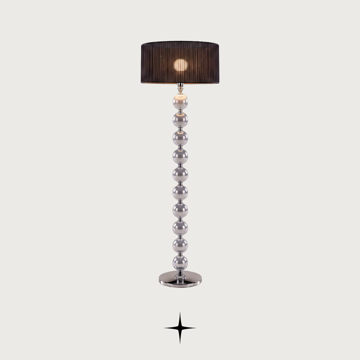 Rosalie floor lamp with stacked crystal spheres and black pleated shade on a dark background
