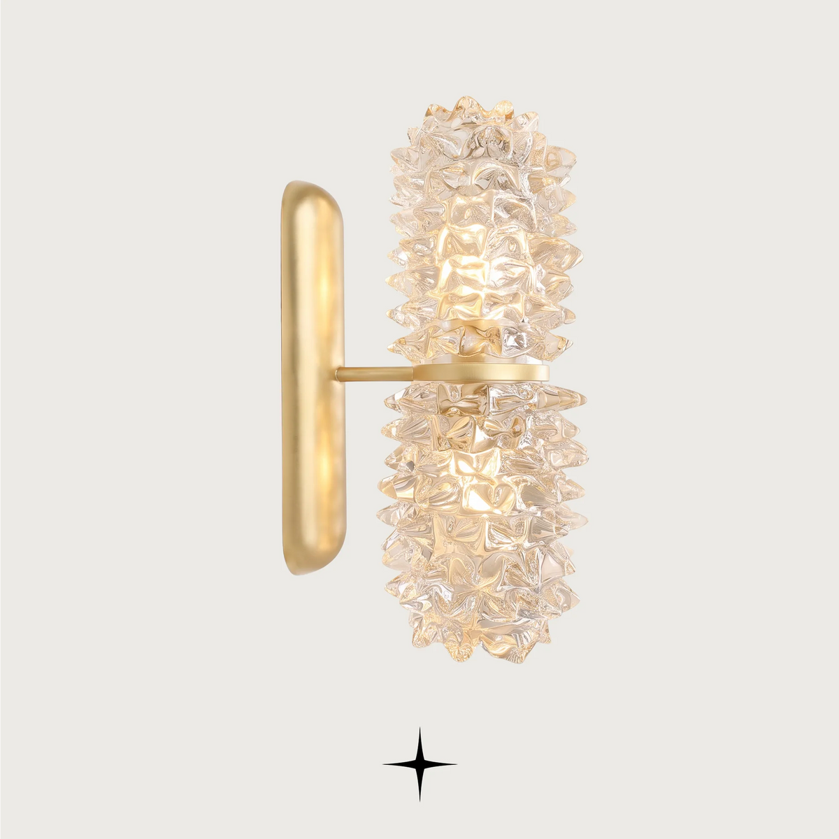 Sahara Wall light fixture featuring stunning clear Murano glass and a luxurious golden frame.
