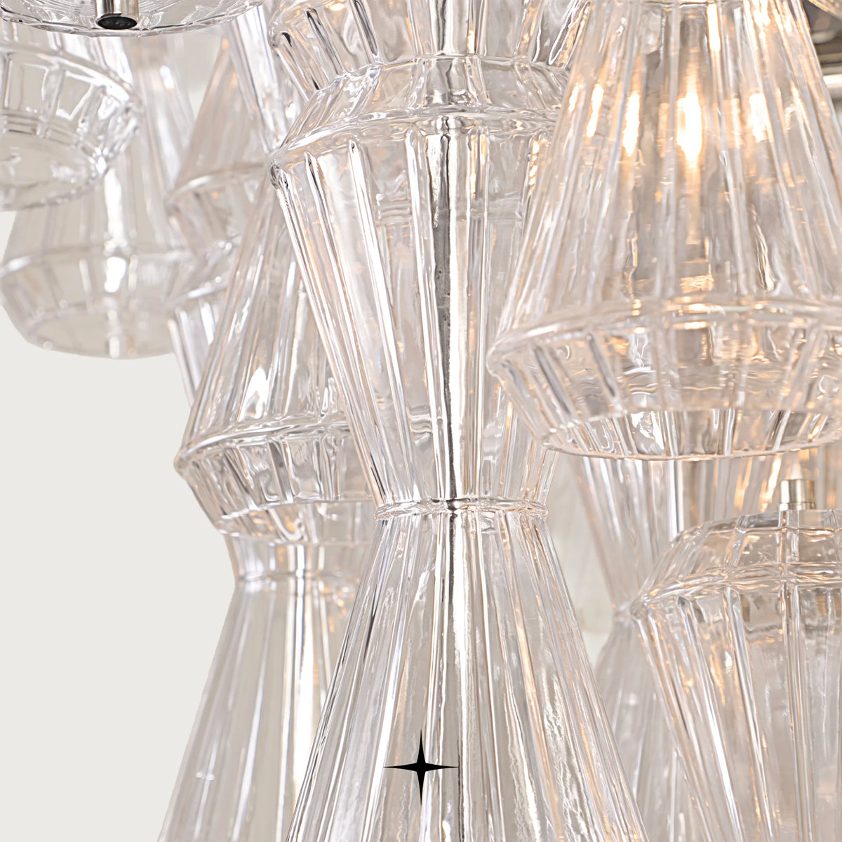 Close-up detail of handcrafted Rigadin glass tubes on Seattle chandelier
