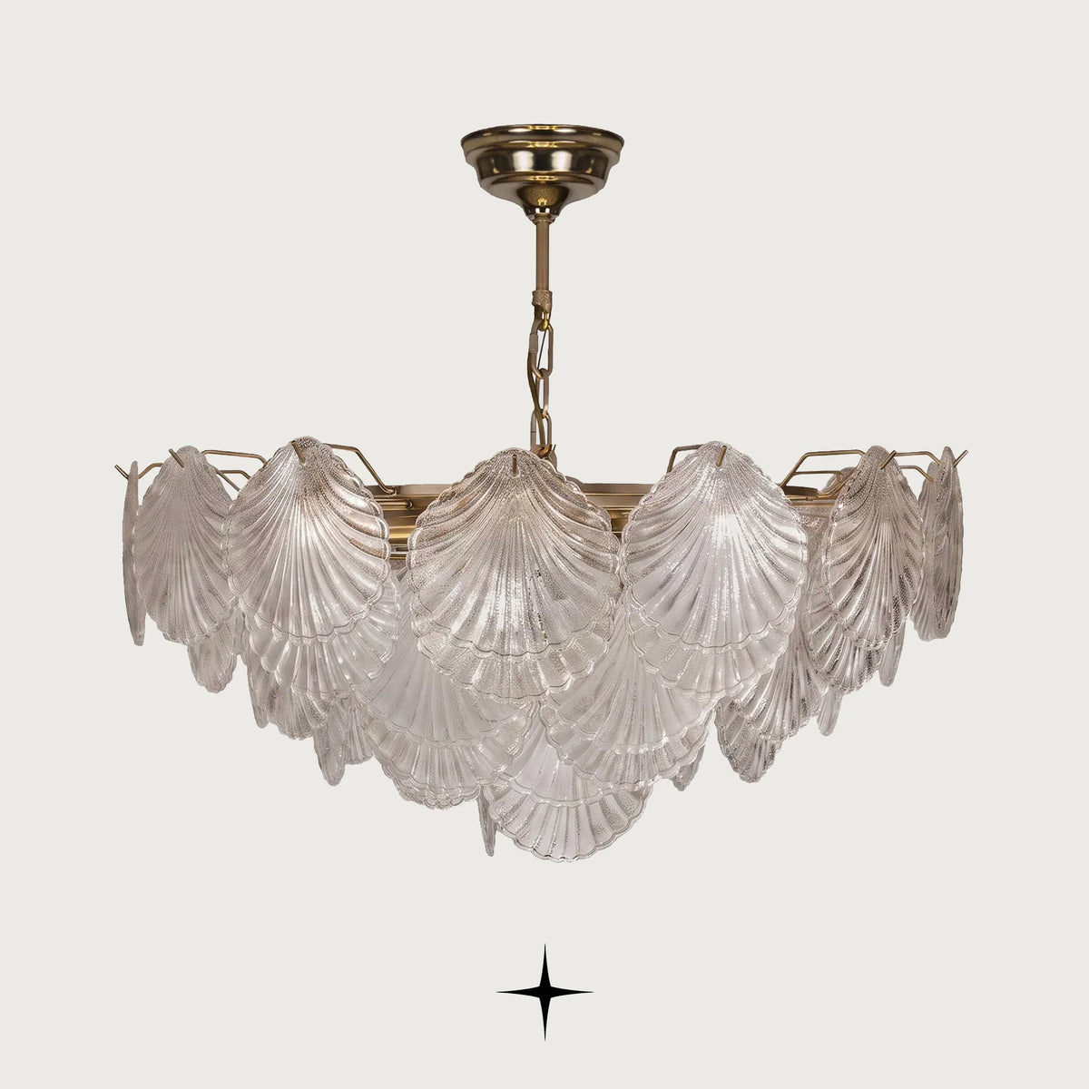 Shellina Seashell Glass Chandelier featuring intricately designed glass shades mimicking cascading seashells with warm brass accents
