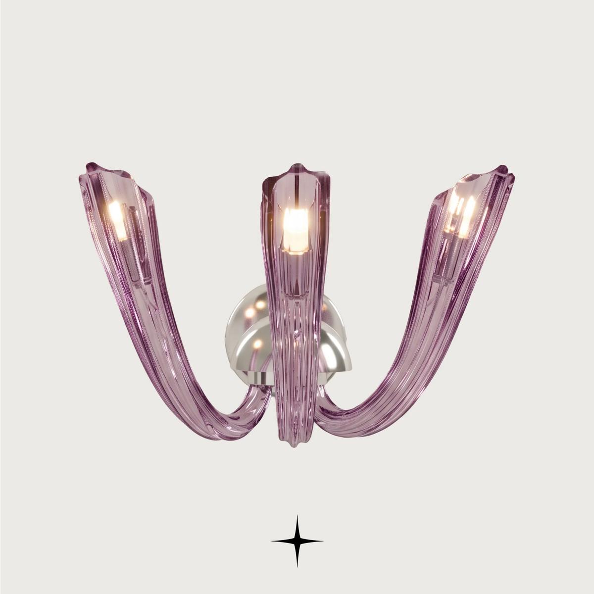 Sienna luxury crystal wall sconce featuring chic, elongated crystal arms with refined craftsmanship.

