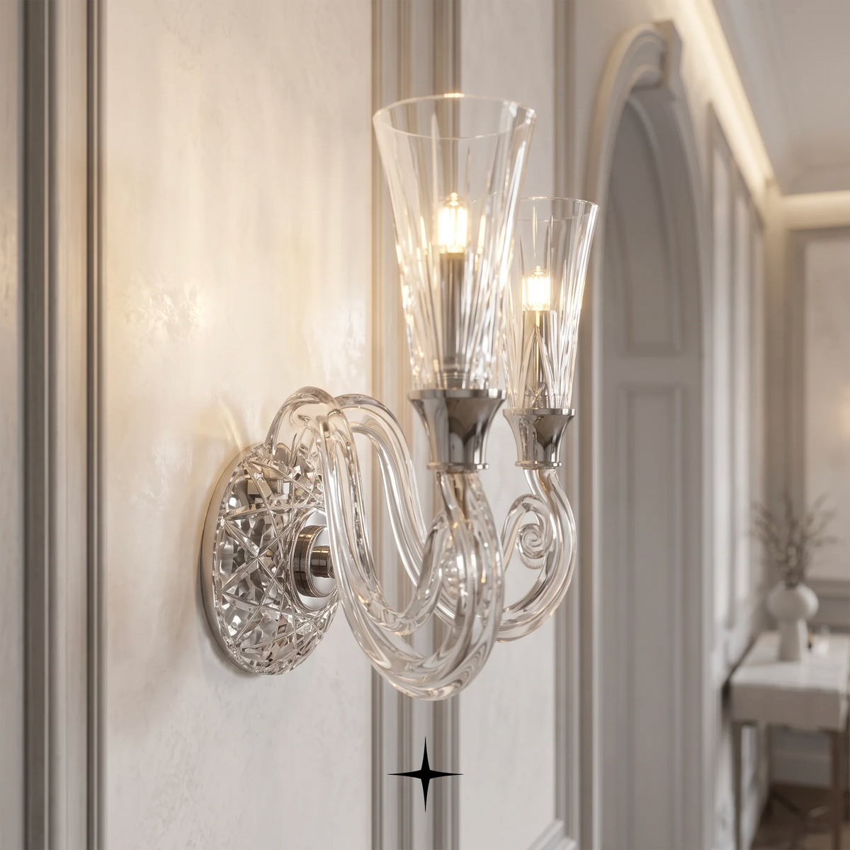Sophia wall light fixture featuring chic elongated crystal arms and refined metallic accents.
