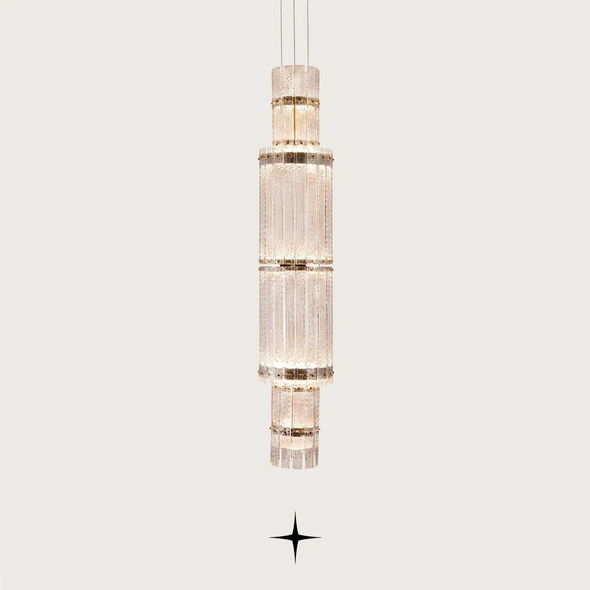Front view of Two Level Chime double-tier glass LED pendant fixture on light grey backdrop