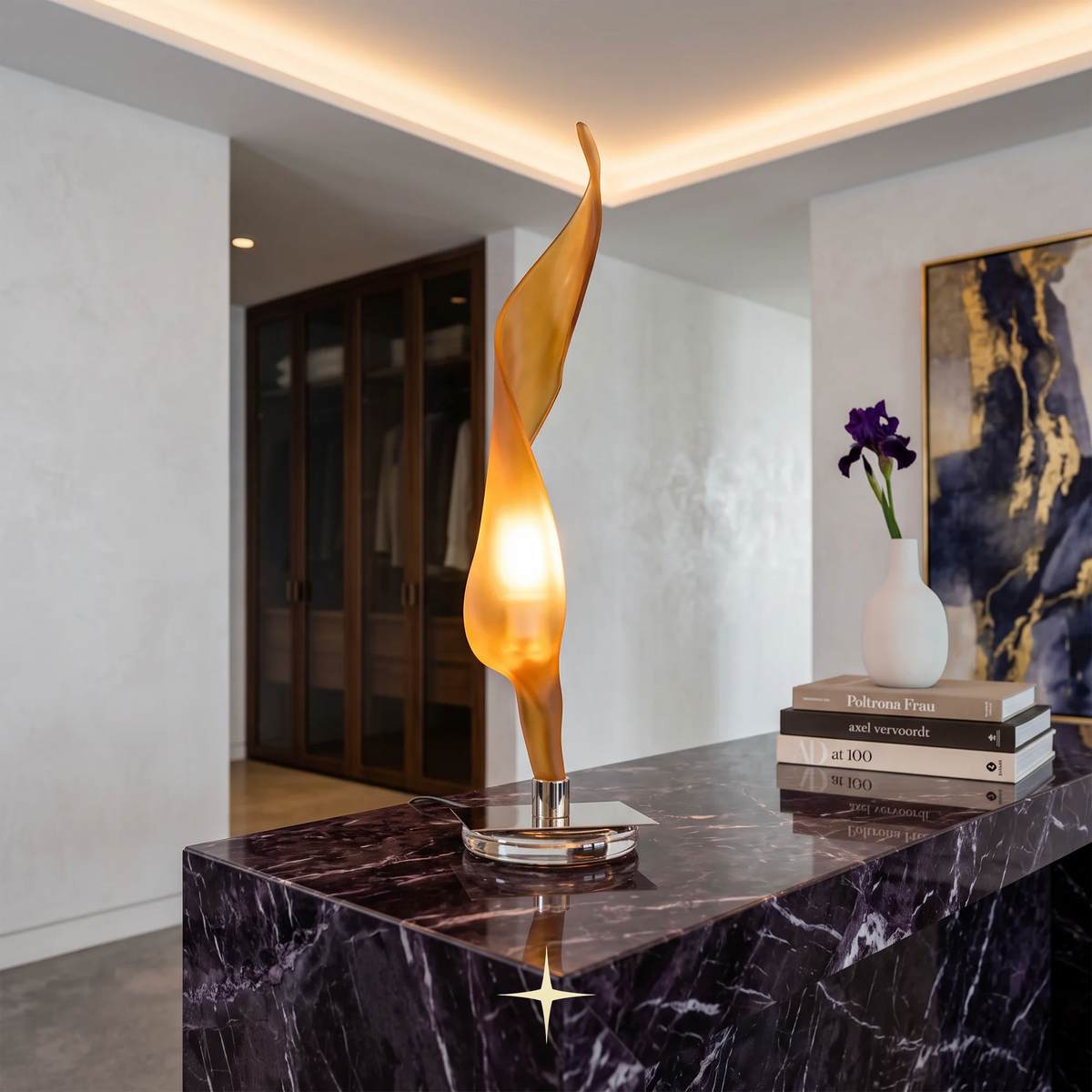 Victoria modern luxury table light with sleek gold silhouette for sophisticated living spaces.
