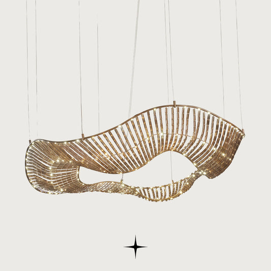 Vortex floating wave-shaped gold crystal chandelier on light grey background