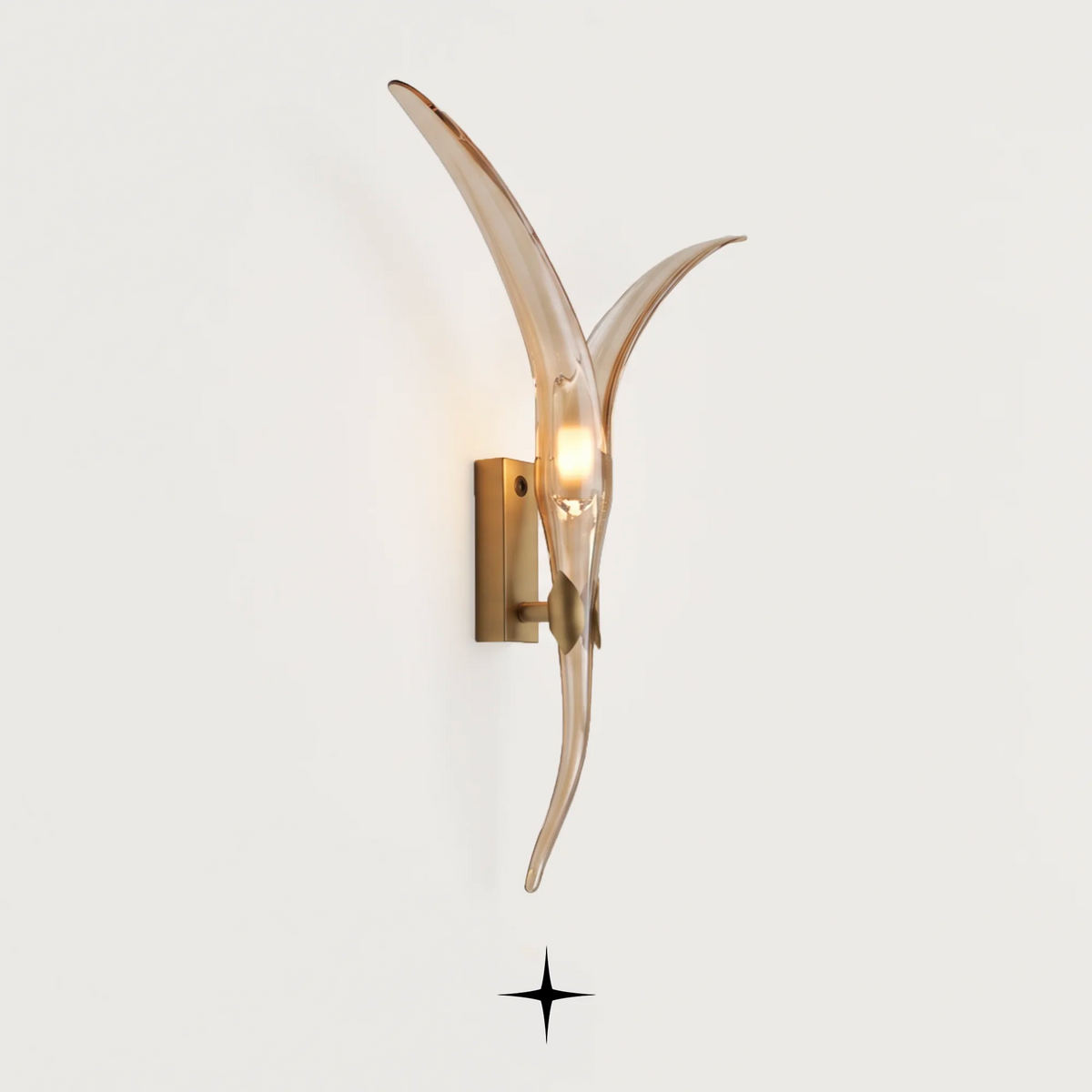 Waverly luxury wall sconce featuring elegant gold finish and fluid crystal arm design
