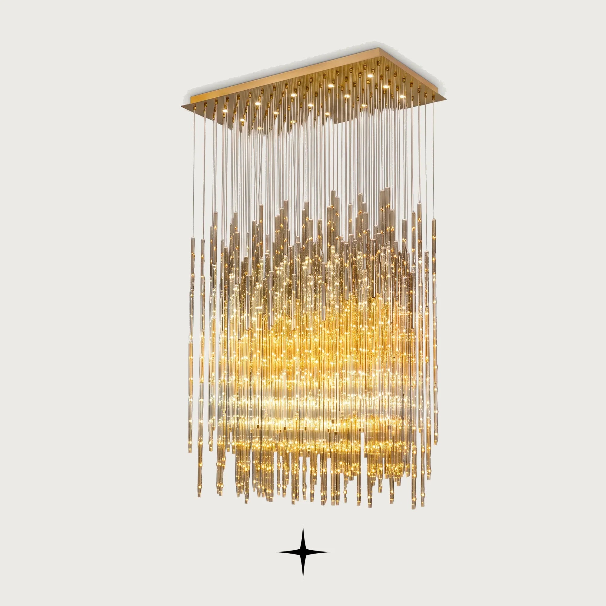 Echo cascading golden glass waterfall chandelier with brass frame on light grey background